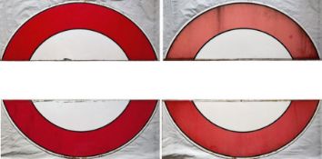 Two pairs of 1930s/40s London Underground enamel 'HALF-MOONS' from platform bullseye signs. Both