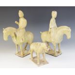 Two Chinese straw-glazed equestrian groups, possibly Sui dynasty, each horse modelled on four legs