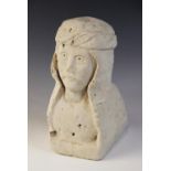 A carved stone corbel depicting the bust of a noble gentleman with moustache and headdress, 31cm