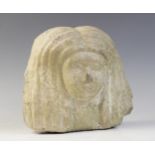 An Egyptian style limestone bust of a woman, 16.5cm high and an Egyptian style stone head of a