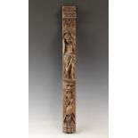 An oak figural pilaster, Flemish, circa 1600, carved with a soldier with sword and shield, atop a