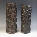 Two 17th century carved oak pillar sections, each carved with scrolling foliage, one with a