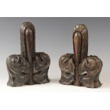 A pair of late 15th century oak poppy head finials, cut from pew ends, 22cm x 15cm (2)