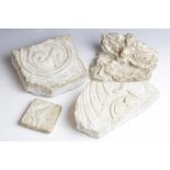 A selection of carved architectural marble fragments, to include a relief carved example depicting a