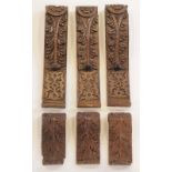 Three 16th century leaf carved corbels, 24cm long together with three 19th century examples 55.5cm