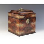 A George III mahogany decanter box, the moulded square hinged cover with applied brass ring handle