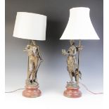 A pair of bronze patinated spelter figures after Ernest Justin Ferrand, one titled 'Travail' the