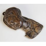 An early 16th century carved oak female profile bust, fragment, circa 1520, carved with headdress
