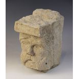 A carved stone head, distinctively carved with a bearded gentleman in the medieval manner, 21.5cm