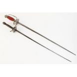 A continental court sword, late 18th century, with 71cm double edge steel blade, clamshell guard and