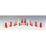 A stained bone continental chess set in the 'Selenus' pattern, 19th century, the kings 8.8cm high,