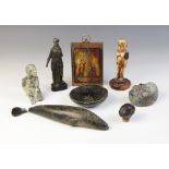 A selection of carvings and objects of virtue, to include a miniature icon depicting the
