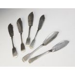A selection of George III and later silver butter knives, to include a Victorian Irish fiddle