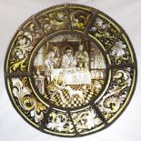 A tondeau stained and painted glass panel, possibly 16th century, the central panel depicting a lord