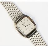 * A Longines Quartz wristwatch, the stainless steel rectangular case with silvered face and baton
