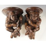 A pair of walnut beam ends, in the 16th century manner, one modelled as a jester the other a