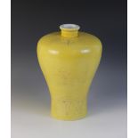 * A Chinese monochrome sgrafitto vase, of meiping form with high shoulders and incised decoration
