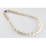 A pearl and diamond choker, comprising twenty-six off-round cultured pearls and nine simulated