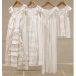 A late 19th century fine white cotton christening gown, with hand worked broderie anglaise front