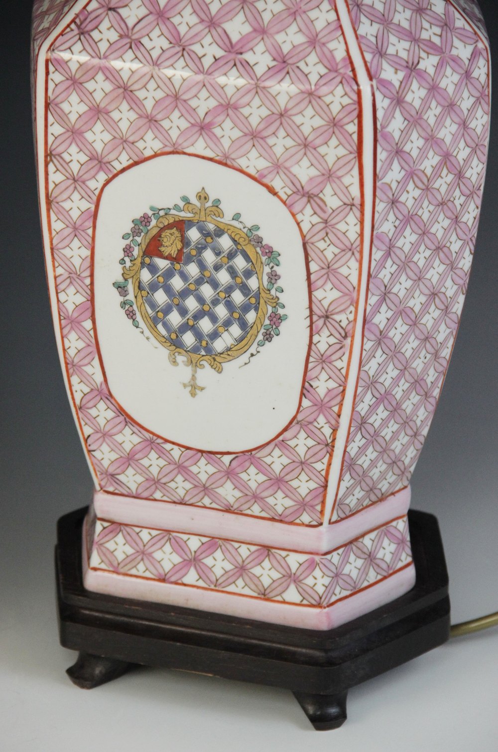 A pair of Chinese export armorial lamp bases, 20th century, each of faceted baluster with pink - Image 2 of 3