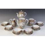 A Japanese Kutani porcelain tea and coffee service, 20th century, comprising; six teacups and