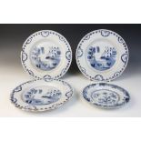 A set of three English Delft tin-glazed plates, 18th century, each of circular form and decorated