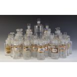 A collection of thirty seven glass apothecary jars of various sizes, late 19th or early 20th