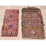 Two Turkish tribal cargo sacks/grain sacks, South East Turkey, 20th century, each woven in wool with