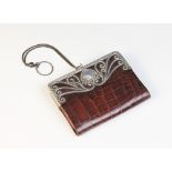 An Edwardian continental silver mounted crocodile evening purse, import marks for 'L.K',