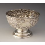An Edwardian silver rose bowl, George Nathan & Ridley Hayes, Chester 1904, of circular form on