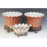 A pair of Chinese export cache pots on stand, 20th century, each of tapering fluted form with