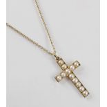 An early 20th century cultured pearl set cross pendant, stamped to reverse '9ct', 32mm x 20mm, set