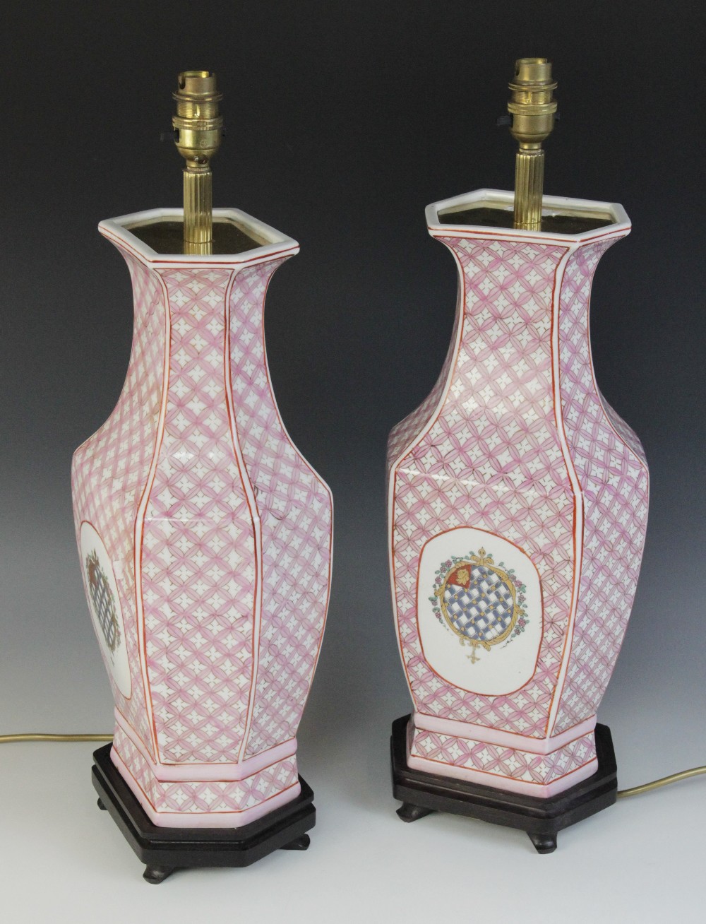 A pair of Chinese export armorial lamp bases, 20th century, each of faceted baluster with pink - Image 3 of 3