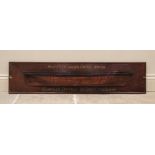 A wall mounted mahogany half ship's hull, applied with ebonised detail and