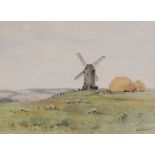 Alfred de Breanski Junior (British, 1877-1957), A bucolic scene with windmill, haystacks and