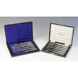 A cased set of six George V cake knives, Yates Brothers, Sheffield 1917, each with weighted silver