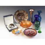 A selection of carnival glass to include a Northwood red coloured bowl, in the cord and grape