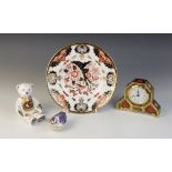 A Royal Crown Derby 'Alphabet Bear' paperweight, gold stopper, with a Royal Crown Derby wren