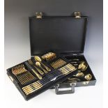 A seventy-piece 23/24 Hartvergoldet gold plated canteen, twelve-place settings, complete in a