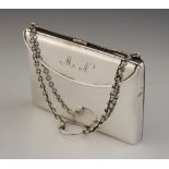 A George V silver purse, Henry Matthews, Birmingham 1919, of rectangular form, spring cover to front