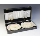 A cased Myott, Sons & Co Art Deco dessert service, comprising: six dessert plates, each hand painted