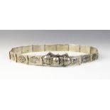 An Armenian silver coloured niello belt, each link designed as an oval panel decorated in niello