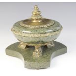 An Art Deco verte marble and gilt metal inkwell, early 20th century, the body of compressed inverted