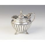 An Edwardian silver wet mustard, possibly Charles Horner, Birmingham 1902, of circular form with