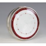 An early 20th century Hungarian silver enamelled box, of circular form with red and white