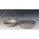 A Christofle silver plated bread bowl, in the form of a circular weaved basket with loop handle,
