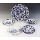 A Delft tin glazed earthenware blue and white charger, c.1700, with Ming style Kraak decoration,