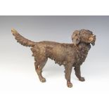 A 19th century style bronze model of a flat coat retriever, modelled standing with tail aloft,