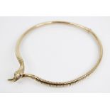 A 9ct gold snake necklace by Smith & Pepper, Birmingham 1960, the head and tail with engraved detail