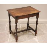 An 18th century and later oak side table, the rectangular top above a plain frieze, raised upon